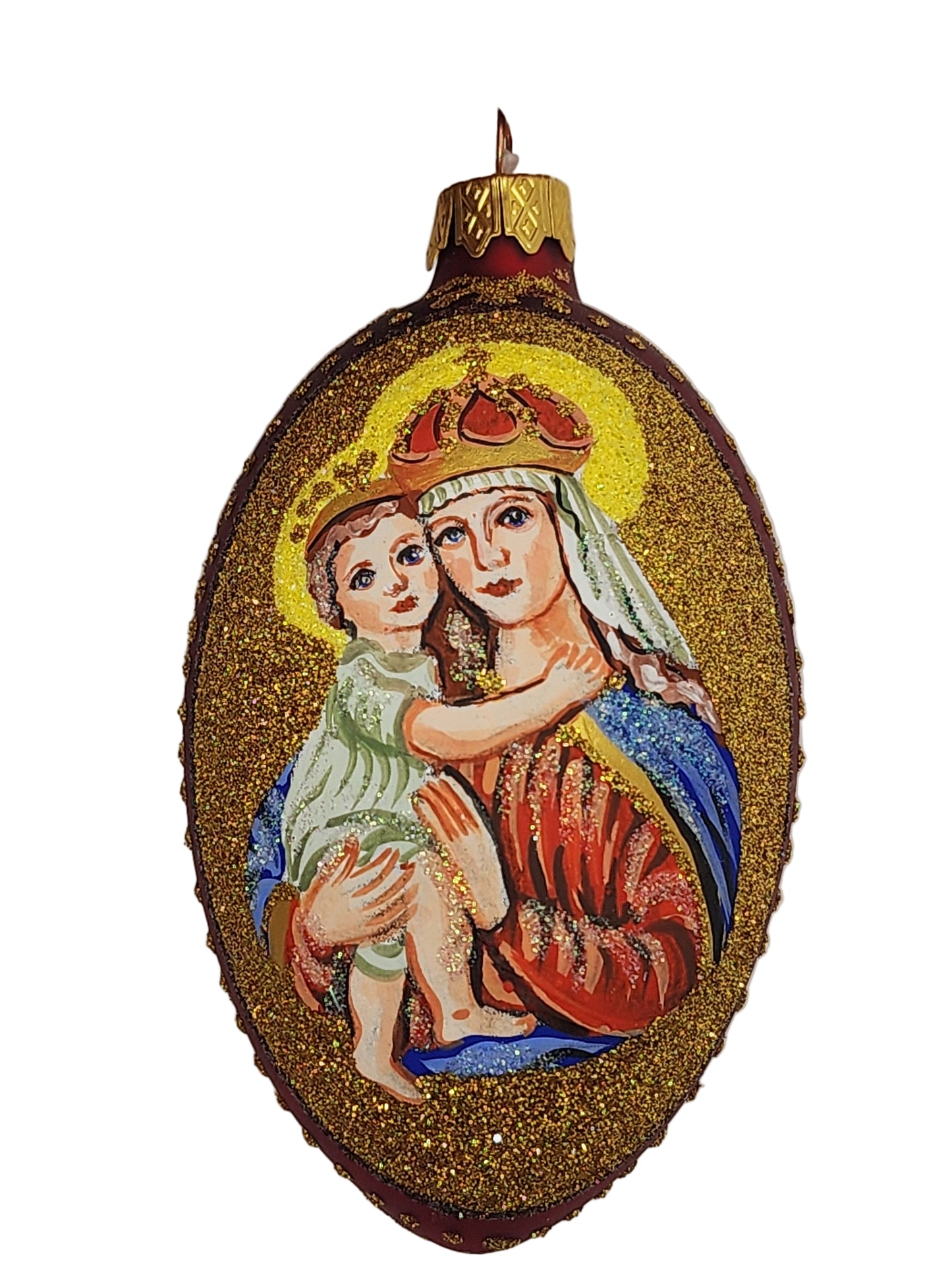 Decorative item with a figure of a woman holding a child on a gold background