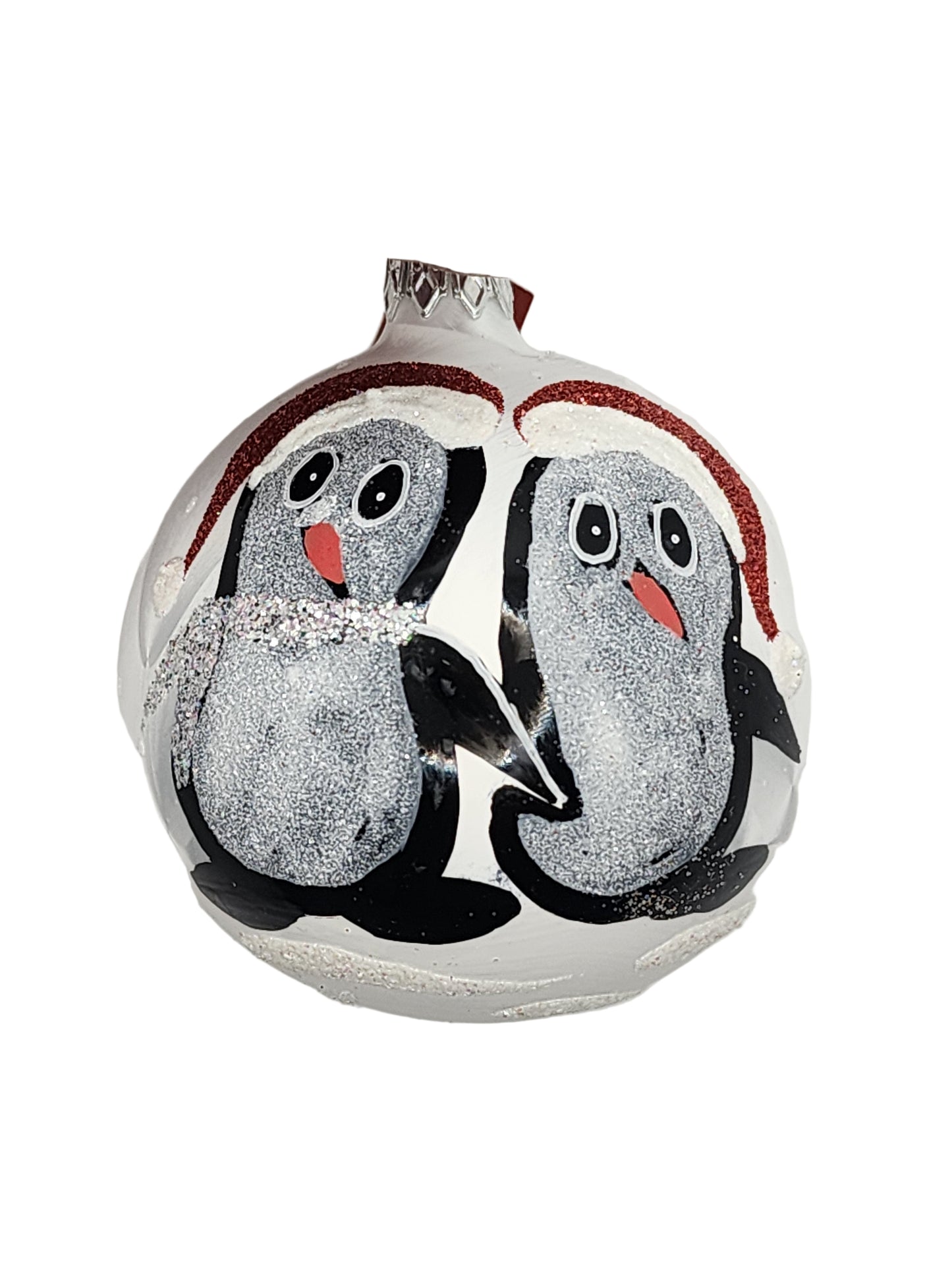 Decorative item with penguin design on a light gray background