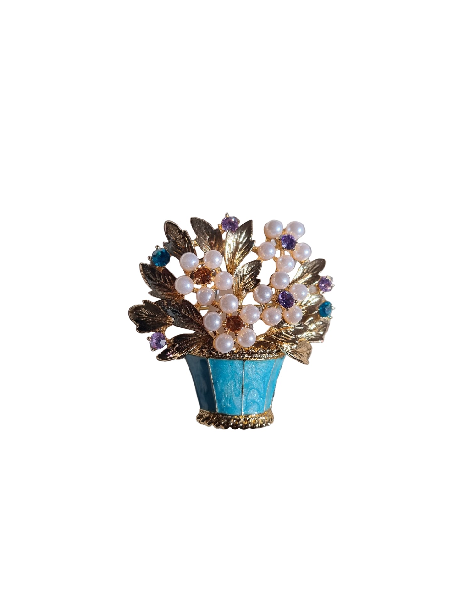 Decorative brooch with pearls and gemstones