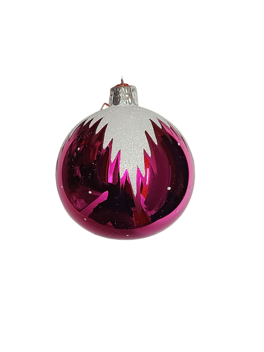 Pink and silver ornament against a white background