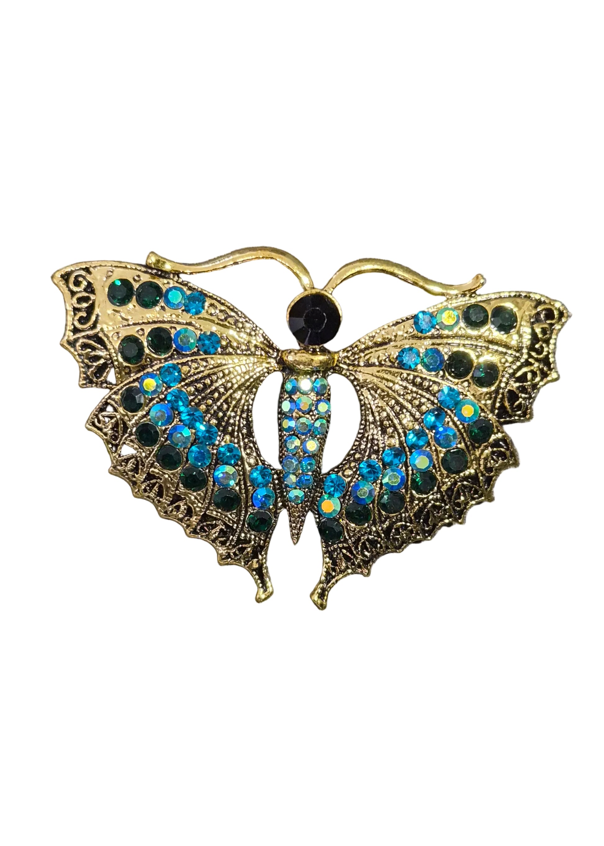 A gold-toned metal moth brooch embellished with iridescent blue and green rhinestones.