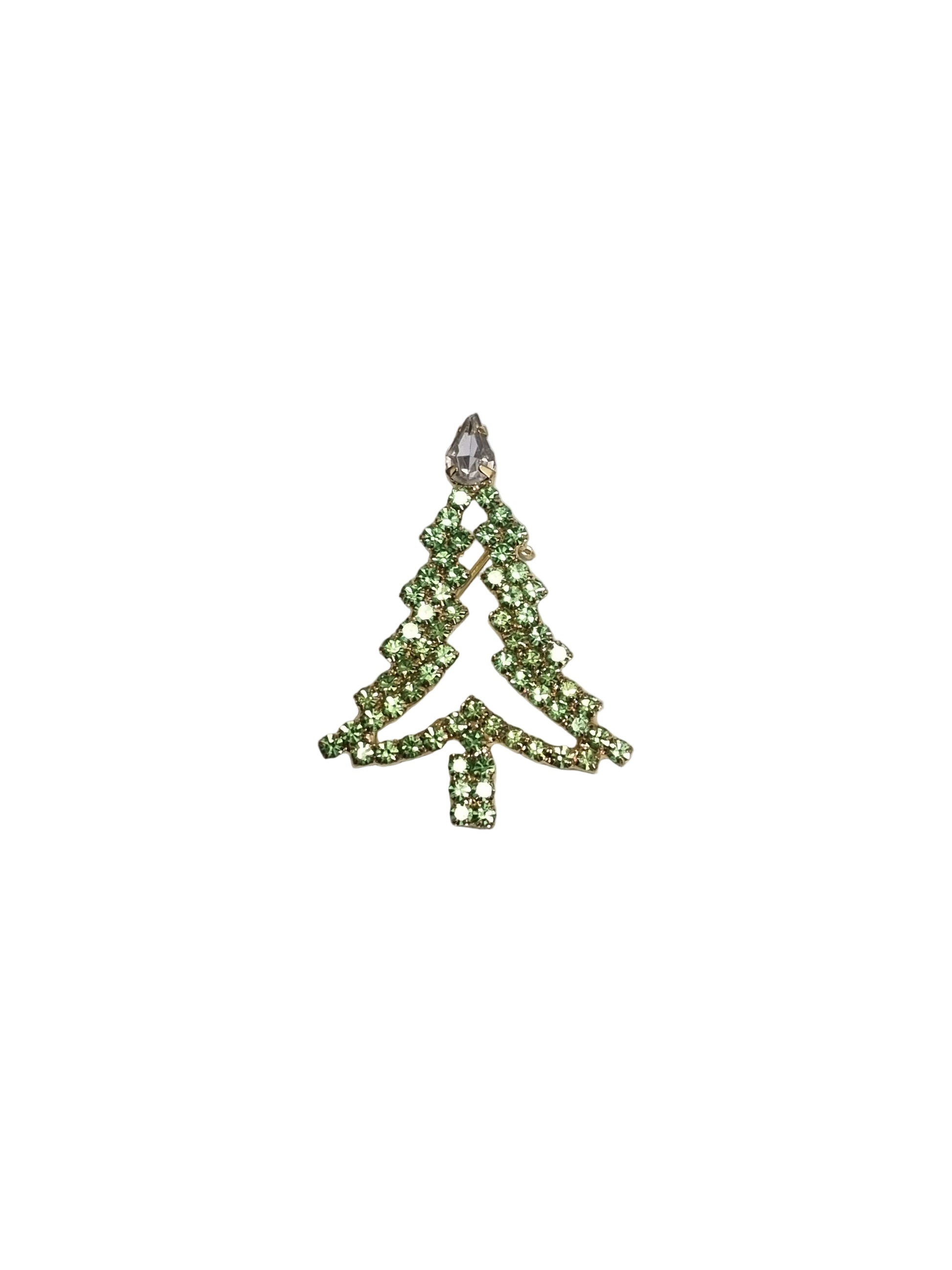 Decorative green bow with rhinestones on a gray background