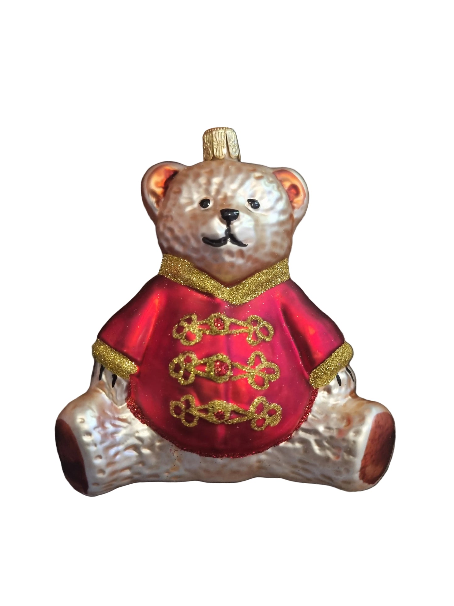 Decorative bear ornament with red heart and gold accents 