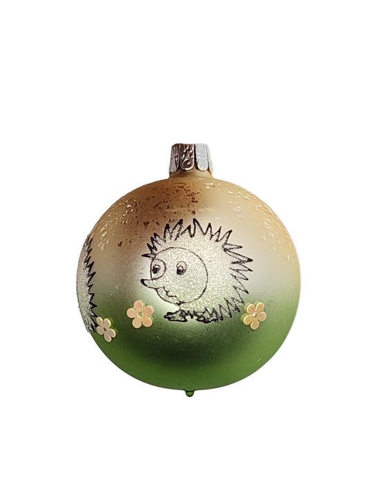 Decorative button with a hedgehog design on a white background