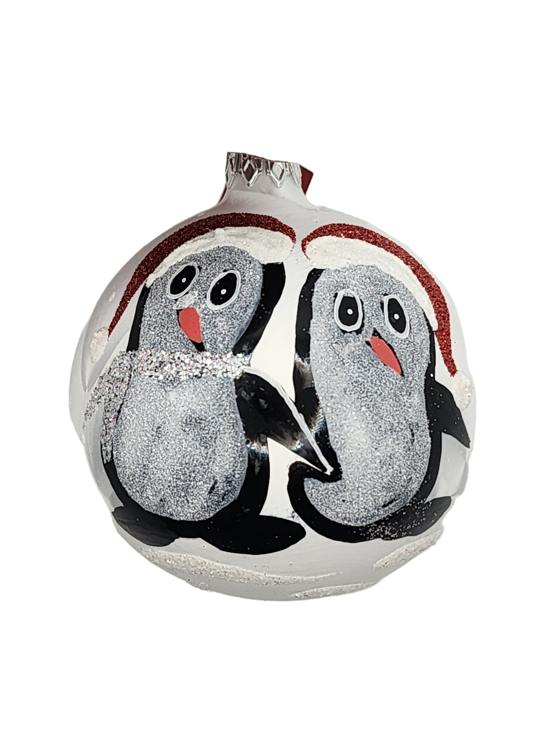 Decorative item with penguin design on a light gray background