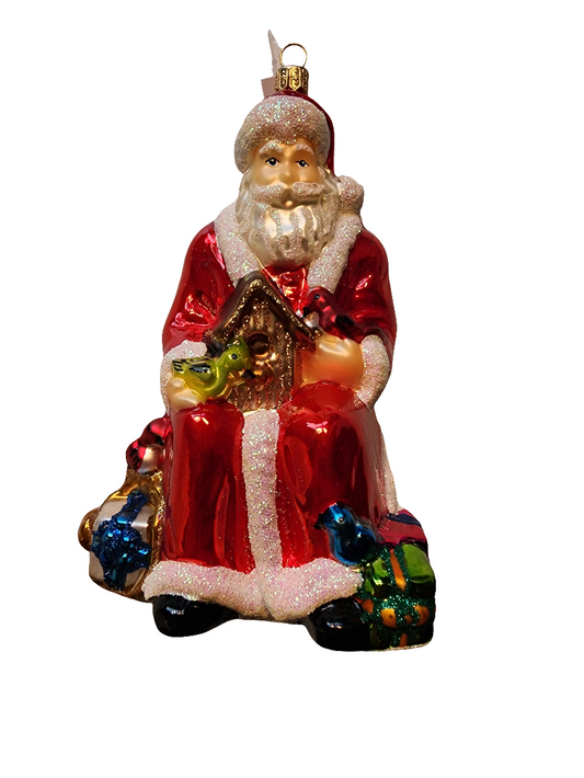 European Glass Christmas ornament of a Santa | Seated with Birdhouse (Z)